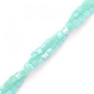 Faceted glass beads Cube 2x2mm Egg shell blue-pearl shine coating